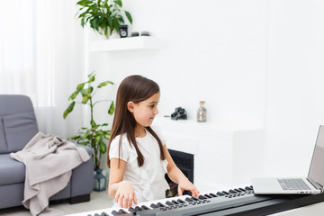 Scene of piano lessons online training or E-class learning while Coronavirus spread out or covid-19...