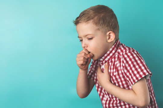 child got sick with a virus. the little boy coughs. coronavirus is dangerous for children