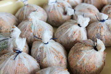 Easter egg coloring. Stage of preparation of decor for Easter, work environment. Bio and natural way of painted eggs with fresh leaves and onion shells. Easter concept.