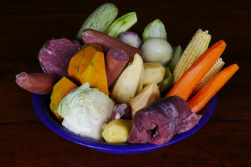 A isolated bowl of vegetables and meat ready to be cooked as a Portuguese Cozido.  - 335867816