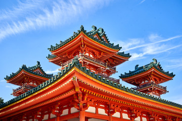 Fototapeta na wymiar Orange temple with mini towers in Kyoto