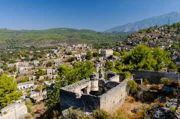 Ruins at the former Greek village of Kayakoy in Turkey, abandoned 1922, now a museum and also known...