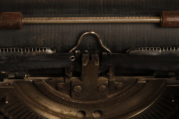 Fototapeta na wymiar Triumph typewriter manufactured in 1930. Triumph antique typewriter.