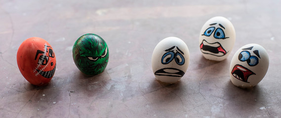 Eggshells painted as face animation to represent Corona virus and the victims. Animation art and...