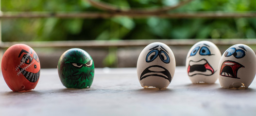 Eggshells painted as face animation to represent Corona virus and the victims. Animation art and object photography.