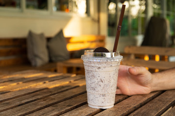 Milkshake with ice cream and oreo cookies. Cool and refreshing on a hot day