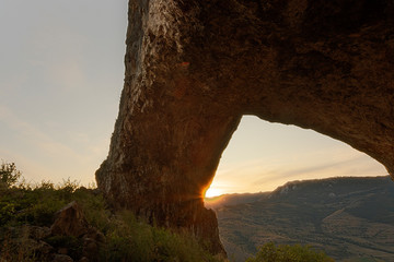 natural limestone arch at sunset