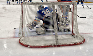hockey sport, game on ice., coaching the goalkeeper.