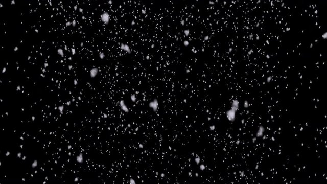 Snow flakes gently and slowly falling down from the sky. Black background, 3d effect. Use: overlay or screen mode on existing footage.