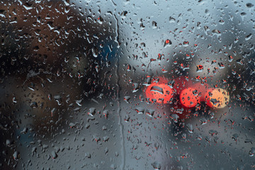 Rain on glass at bustop