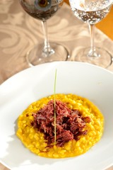 Pumpkin risotto with dried meat..