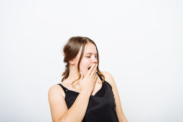 Fototapeta premium Yawns. Female