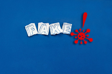 Trendy banner with fake news on blue background. Coronavirus pandemic concept with copy space.