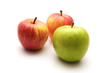 three whole apples isolated on a white background
