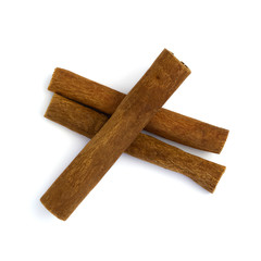 Crossed cinnamon sticks isolated on a white background. Top view.