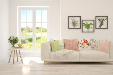 White living room with sofa and summer landscape in window. Scandinavian interior design. 3D illustration