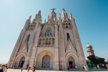 Fototapeta na wymiar Tibidabo church on mountain in Barcelona with christ statue