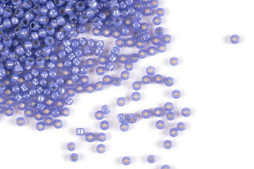 Isolated beads on a white background, scattered beads, blue beads