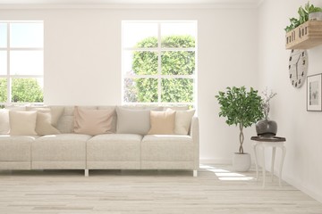 White living room with sofa and summer landscape in window. Scandinavian interior design. 3D illustration
