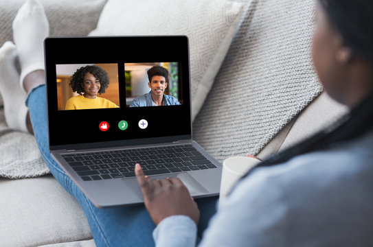 Black Woman Having Online Video Call On Laptop With Friends