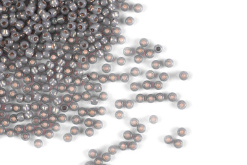 Isolated beads on a white background, scattered beads, grey beads