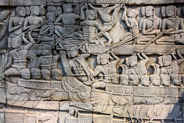Picturial stories carved into the wall at the Unesco World Heritage site of Ankor Thom, Siem Reap,...