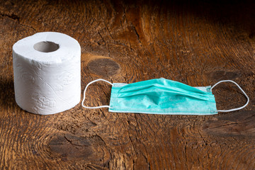 toilet paper and medical mask