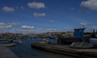 the colorful boats of Marsaxlokk harbor