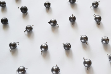 Fishing equipment: Fishing sinkers isolated on a white background.