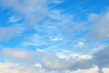 Cirrocumulus and cumulus clouds on blue sky, nature background without focus.