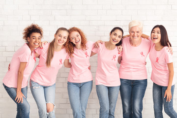 Diverse Women And Girls In Pink T-Shirts Hugging, White Background
