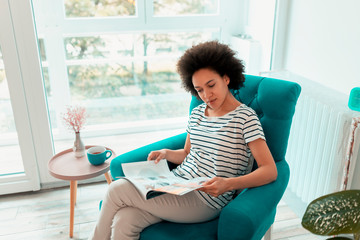 Woman reading a magazine