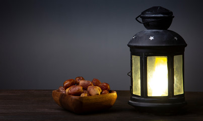Ramadan Kareem celebration with lanterns and Dried date palm fruits ramazan food
