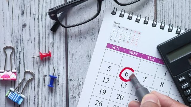 deadline concept with circle and push pin on calendar date 