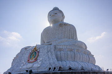 Fototapeta premium Marble clad Big Buddha, or The Great Buddha of Phuket, a seated Maravija Buddha statue in Phuket, Thailand.