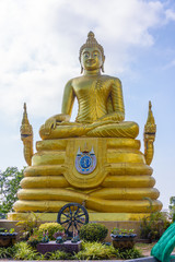 Statue of a golden Buddha with serpents, Thailand