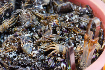 Salted crabs on sale in the traditional Mae Somchit Kata Fresh Market, Kata, Phuket, Thailand