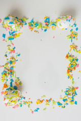 Easter eggs decorated with paper confetti. Frame