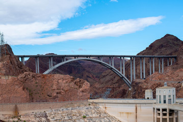 Hoover Dam is a concrete arch-gravity dam in the Black Canyon of the Colorado River, on the border between the U.S. states of Nevada and Arizona.