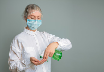 Closeup with a beautiful woman face wearing surgical mask.