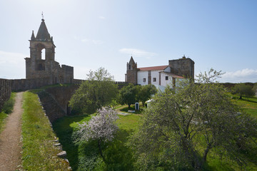Fototapeta na wymiar Mourao castle towers and wall historic building with interior garden in Alentejo, Portugal