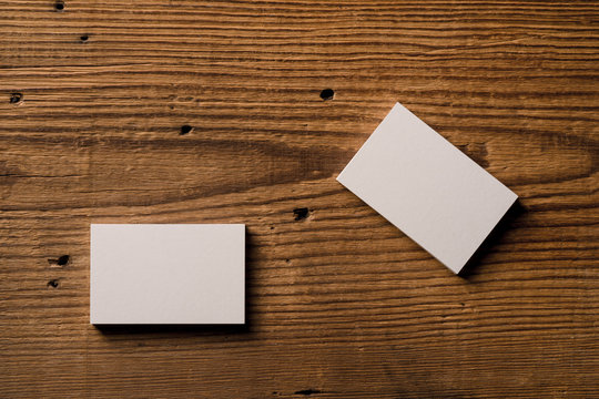 business card mockup on old wood highlighting carpentry craft - Powered by Adobe