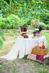 Delicious chocolate cake, red velvet in a glass, wild flowers, berries.