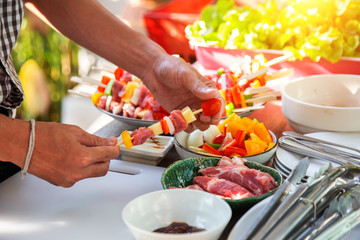 Barbeque Grill Street Food in thailand,Eat outdoors in a happy family.