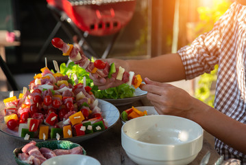 Barbeque Grill Street Food in thailand,Eat outdoors in a happy family.