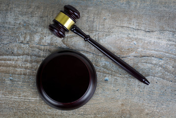 Wooden judgement or auction mallet. Conceptual image