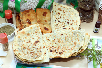 Traditional wheat Baku lavash bread. Traditional lavash homemade Azerbaijan bread on wooden table. Azerbaijan lavash food .