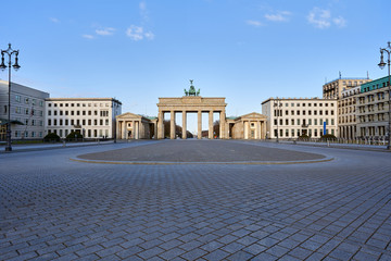 view on the famous Brandenburg gate on the Pariser square in Berlin city, parisian square without...
