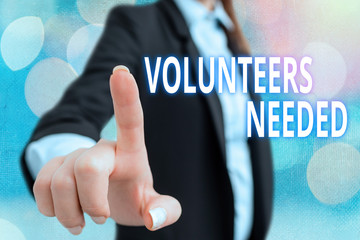 Writing note showing Volunteers Needed. Business concept for need work or help for organization...