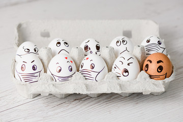 Funny faces of Easter eggs with masks